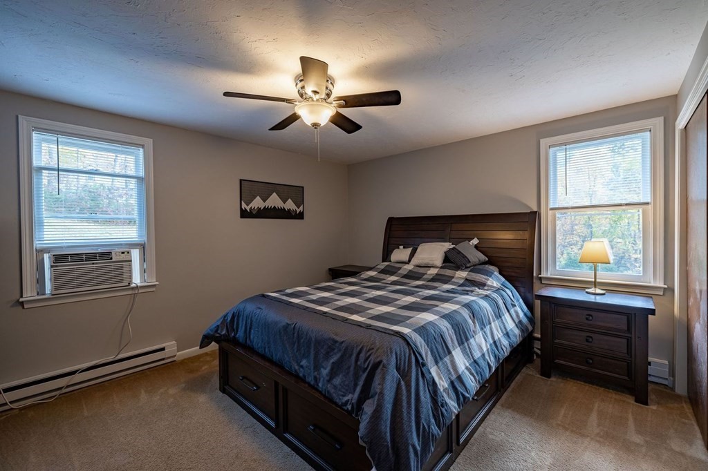 198 Lower Gore Road Webster, MA 01570 - Photo 20 of 41 a bedroom with a bed and window