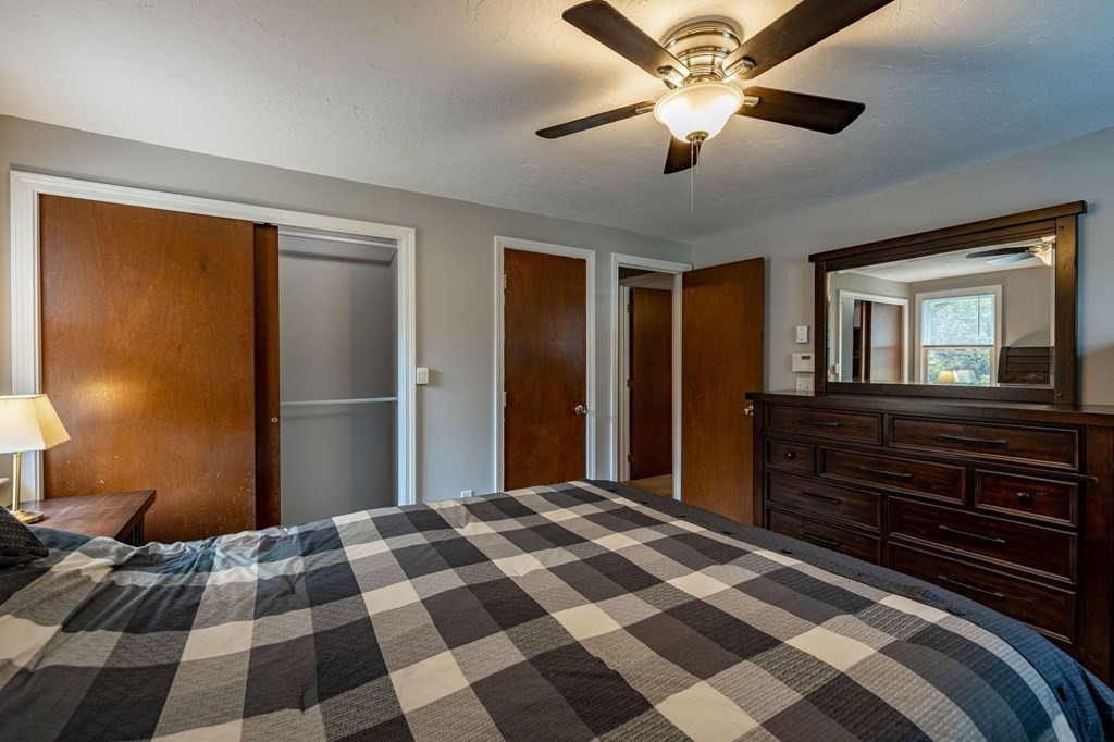 198 Lower Gore Road Webster, MA 01570 - Photo 21 of 41 a bedroom with a bed and a window