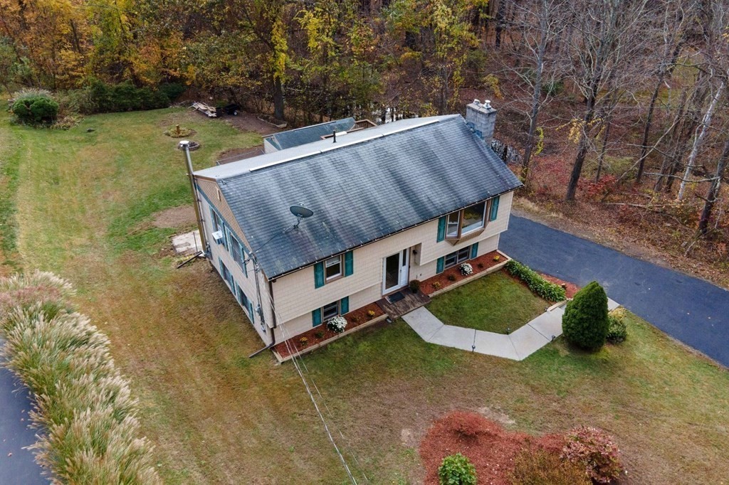 198 Lower Gore Road Webster, MA 01570 - Photo 3 of 41 a view of a couches in the patio with a yard