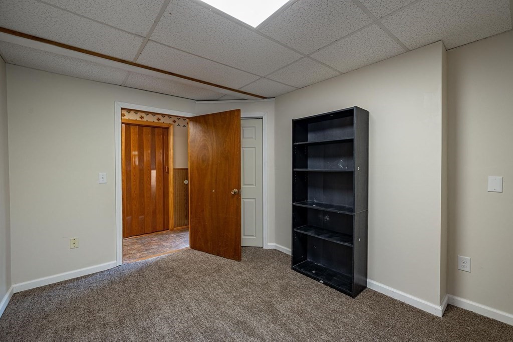 198 Lower Gore Road Webster, MA 01570 - Photo 32 of 41 a view of an empty room and a hallway