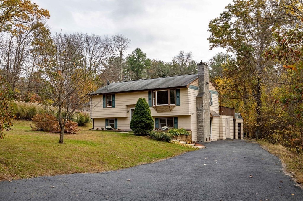 198 Lower Gore Road Webster, MA 01570 - Photo 4 of 41 a view of a house with a yard covered with snow