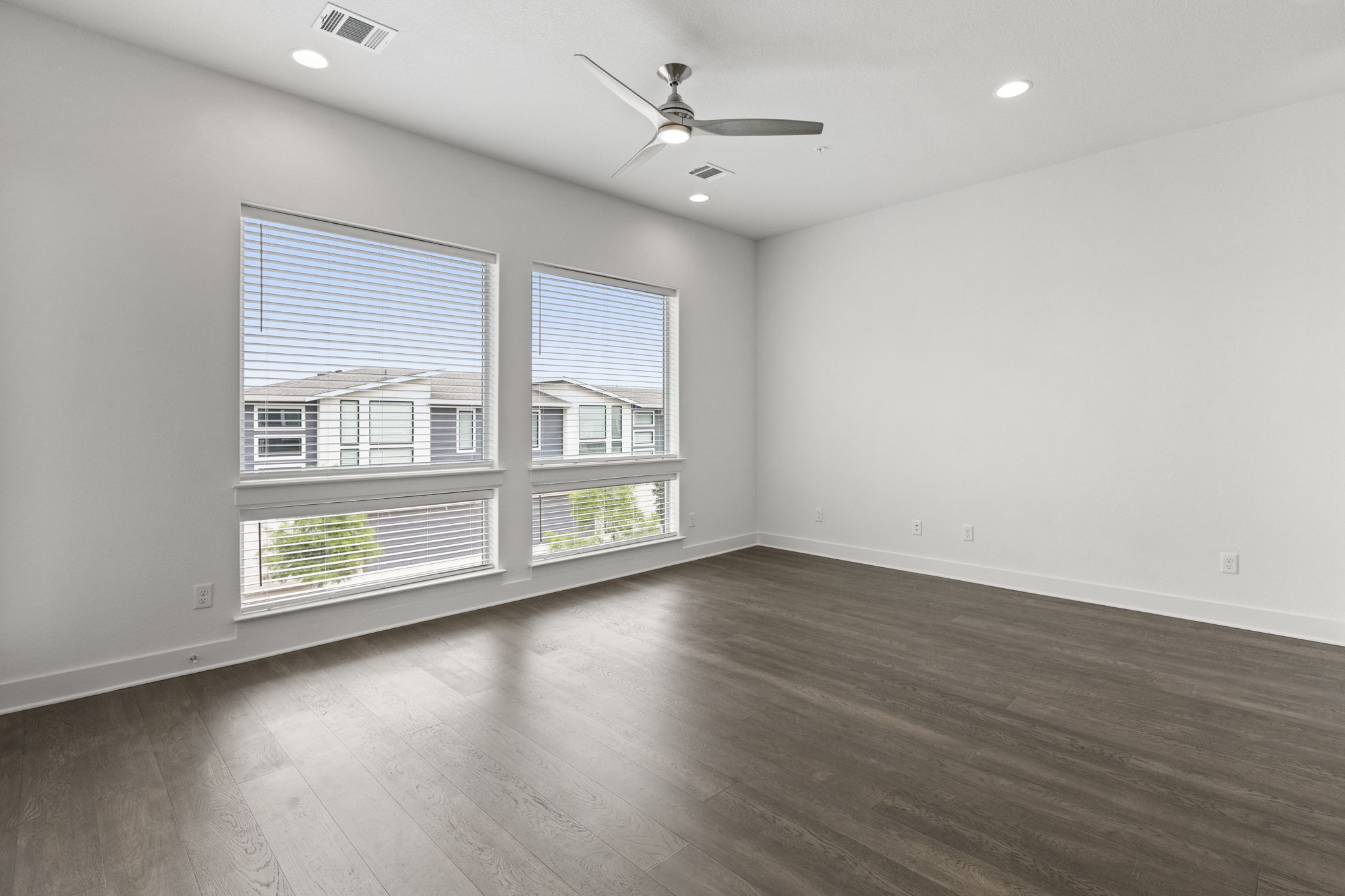 2050 Lohmans Spur Road, Unit 2005 Lakeway, TX 78734 - Photo 33 of 36 2050 Lohmans Spur #2005 - the main floor has an open floorplan with modern kitchen, large living and dining area, and an outdoor balcony.