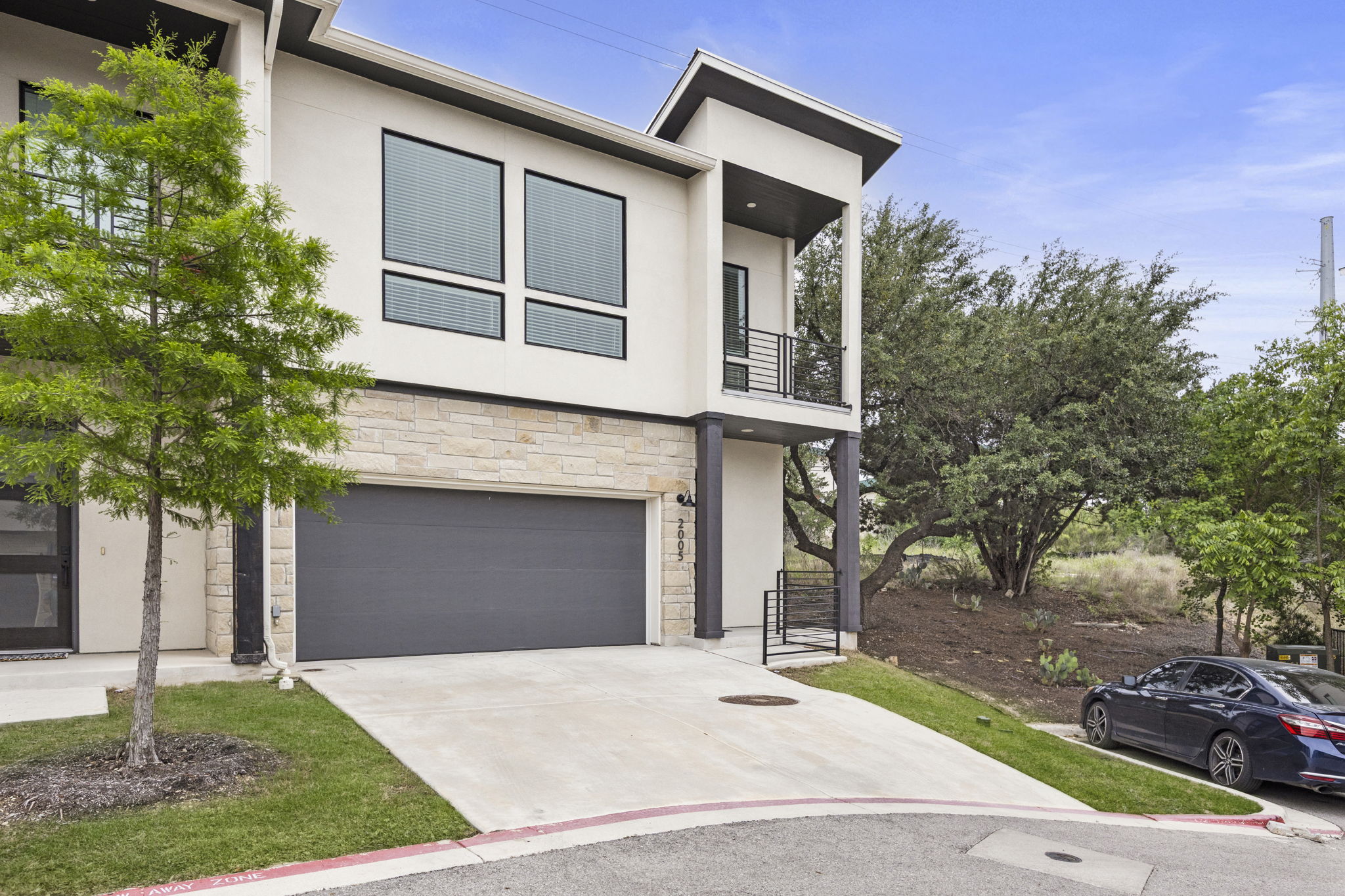 2050 Lohmans Spur Road, Unit 2005 Lakeway, TX 78734 - Photo 24 of 36 2050 Lohmans Spur #2005 is a prized corner unit with a two-story floorplan and two-car garage