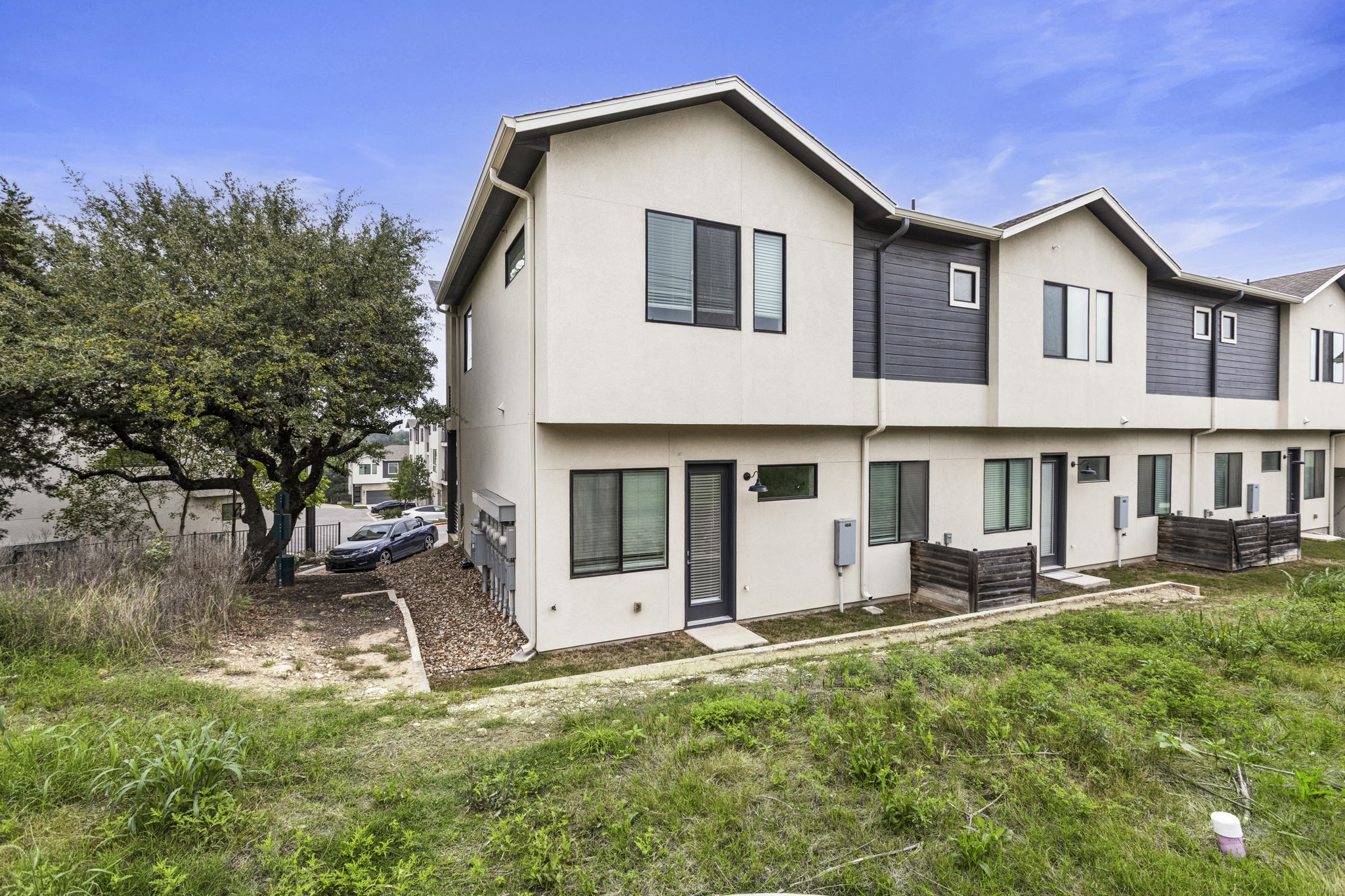 2050 Lohmans Spur Road, Unit 2005 Lakeway, TX 78734 - Photo 18 of 36 2050 Lohmans Spur #2005 features a small backyard patio and no backyard neighbors.