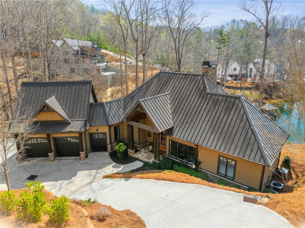 827 Top Ridge Drive Sunset, SC 29685 - Photo 1 of 44 This exquisite property offers a private driveway, a spacious garage, and captivating lake views.