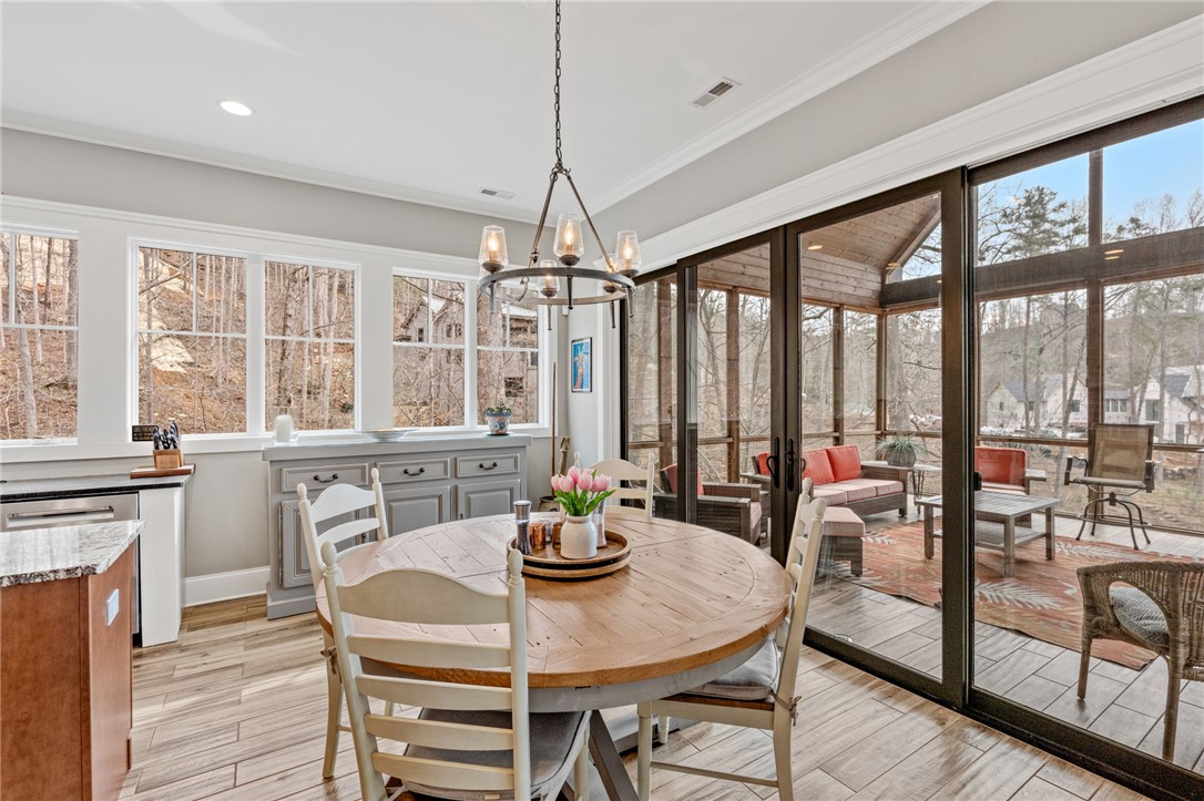 827 Top Ridge Drive Sunset, SC 29685 - Photo 14 of 44 This eat-in kitchen features ample natural light and seamless access to an inviting screened porch.