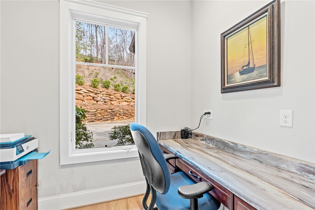 827 Top Ridge Drive Sunset, SC 29685 - Photo 22 of 44 This dedicated workspace offers natural light and a pleasant view.
