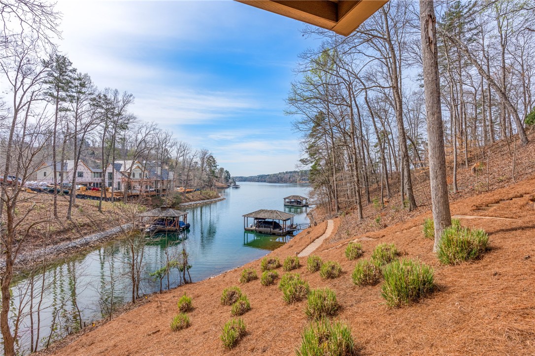 827 Top Ridge Drive Sunset, SC 29685 - Photo 33 of 44 This serene waterfront property offers tranquil lake views and direct access for boating.