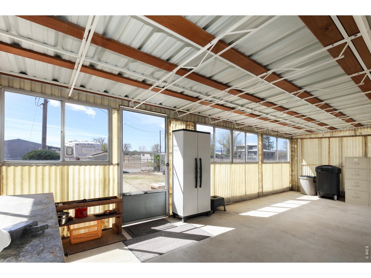 11818 Kenosha Road Longmont, CO 80504 - Photo 33 of 43 Covered back patio area!