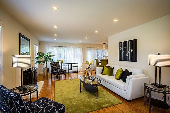 564 Alhambra Road San Mateo, CA 94402 - Photo 3 of 25 a living room with furniture and wooden floor