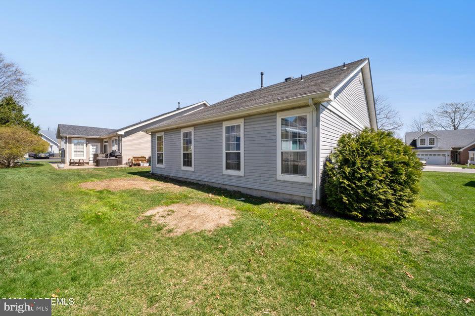 84 Chain Boulevard Bayville, NJ 08721 - Photo 24 of 39 a view of a house with backyard and garden