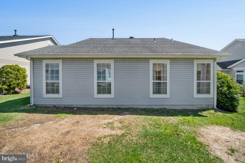 84 Chain Boulevard Bayville, NJ 08721 - Photo 25 of 39 a front view of a house