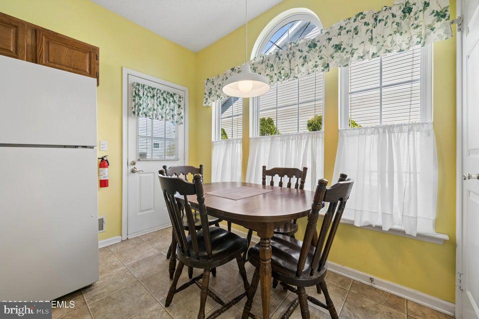 84 Chain Boulevard Bayville, NJ 08721 - Photo 10 of 39 a dining room with furniture and window