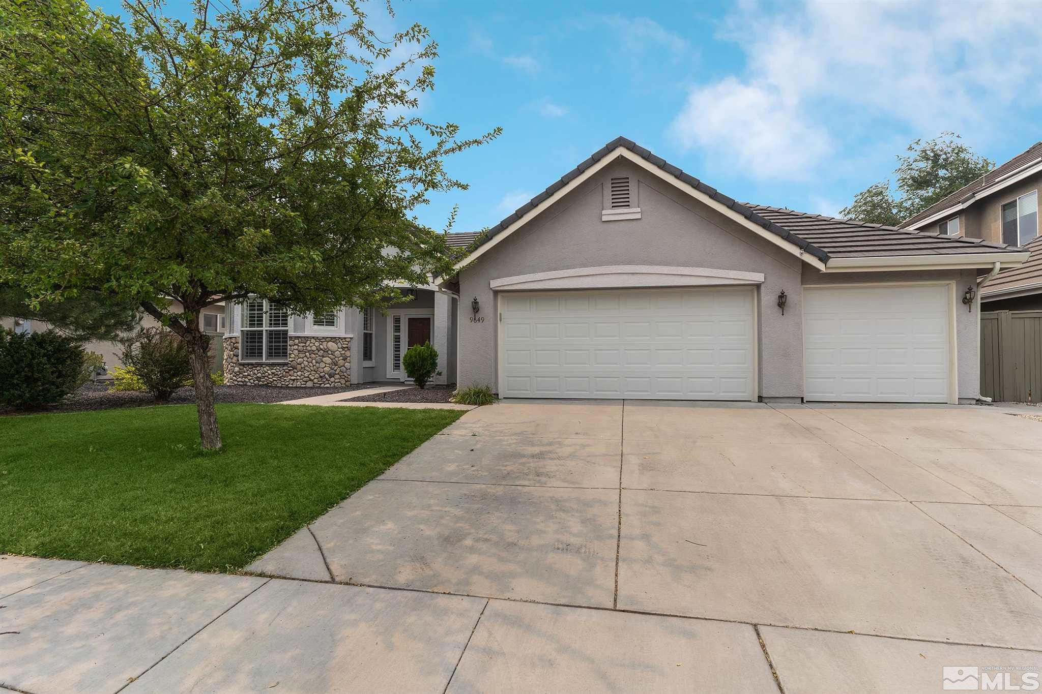 9649 Shadowstone Way Reno, NV 89521 - Photo 20 of 20 a front view of house with yard and trees