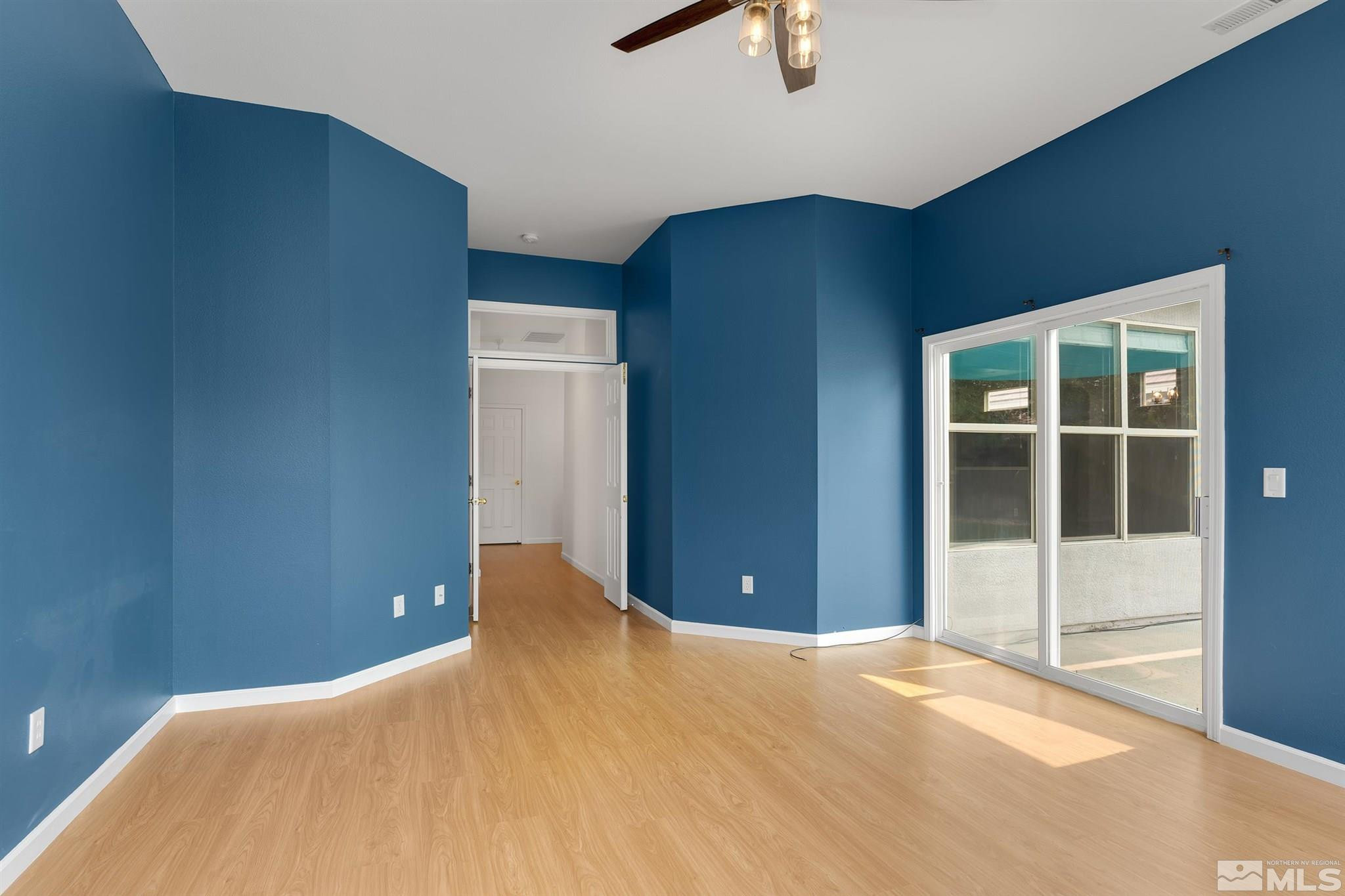 9649 Shadowstone Way Reno, NV 89521 - Photo 10 of 20 a view of a big room with windows