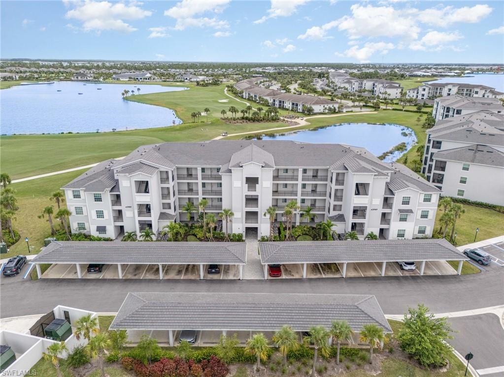 43989 Boardwalk Loop, Unit 2043 Babcock Ranch, FL 33982 - Photo 2 of 45 a view of a city with an ocean view