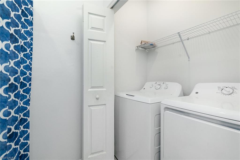 43989 Boardwalk Loop, Unit 2043 Babcock Ranch, FL 33982 - Photo 26 of 45 a utility room with dryer and washer