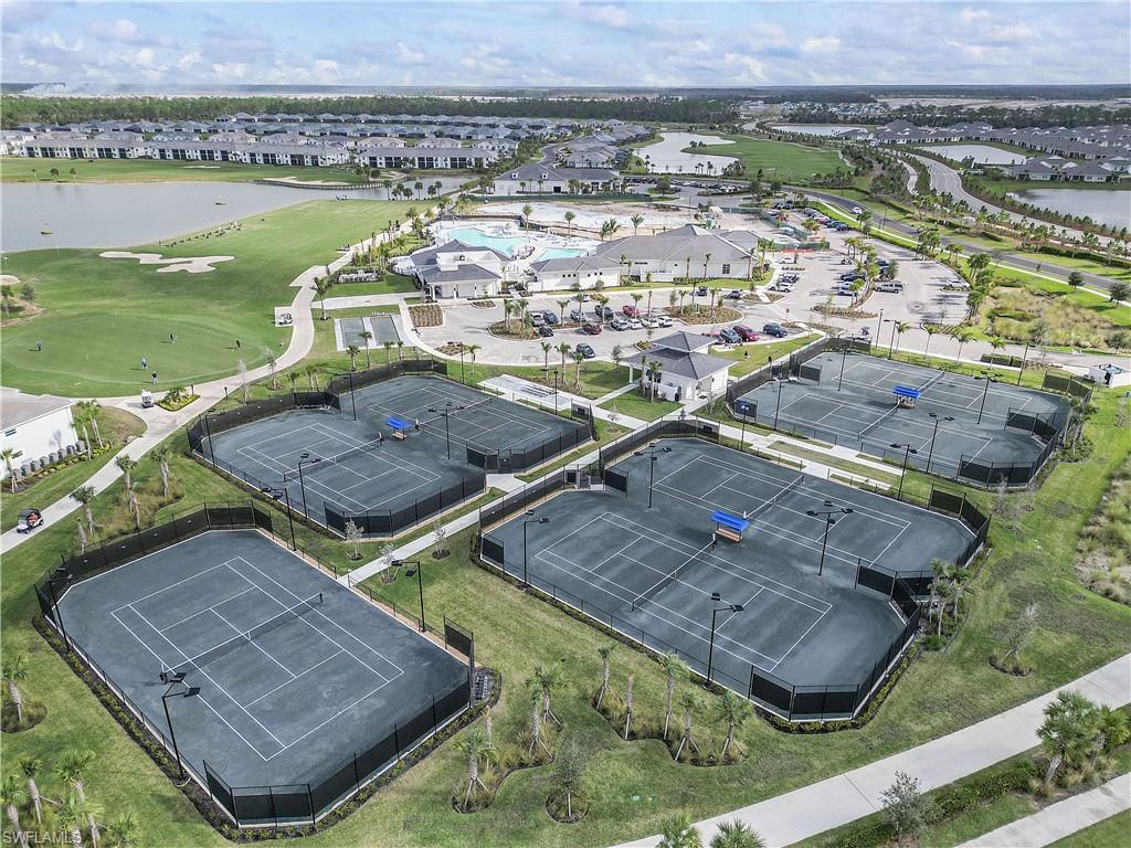 43989 Boardwalk Loop, Unit 2043 Babcock Ranch, FL 33982 - Photo 28 of 45 an aerial view of residential houses with outdoor space