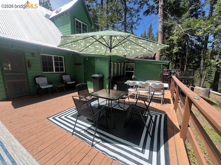 26175 Janice Way Long Barn, CA 95335 - Photo 20 of 23 Wooden deck featuring outdoor dining area