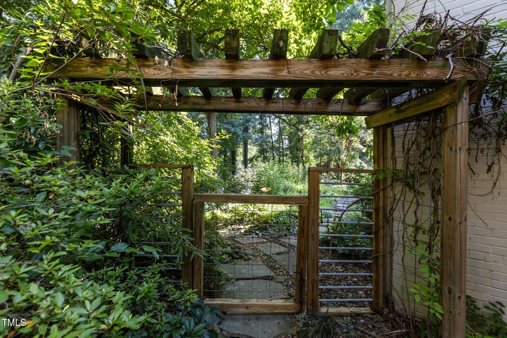 2706 Stuart Drive Durham, NC 27707 - Photo 24 of 26 a front view of a house with a yard