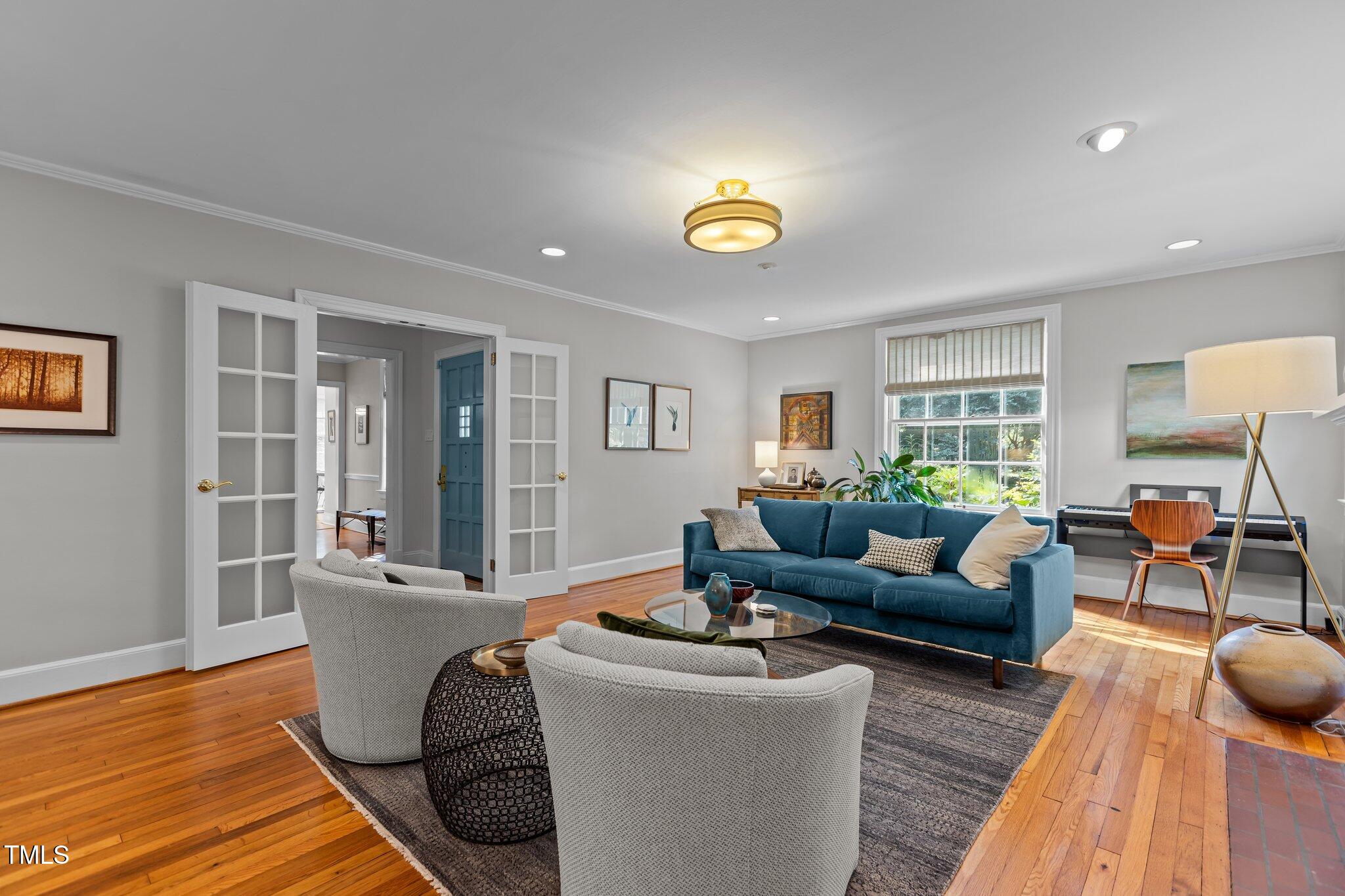 2706 Stuart Drive Durham, NC 27707 - Photo 6 of 26 a living room with furniture and wooden floor