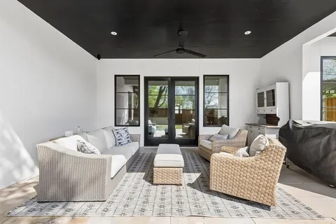 a view of yard with patio