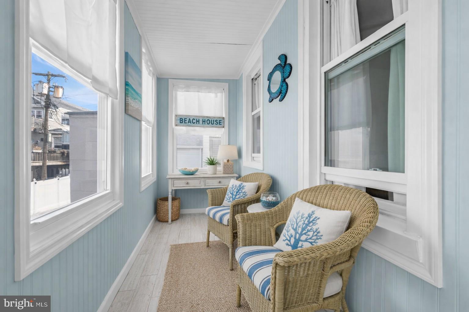 6 Beach Street Sea Bright, NJ 07760 - Photo 5 of 26 a living room with furniture and a window