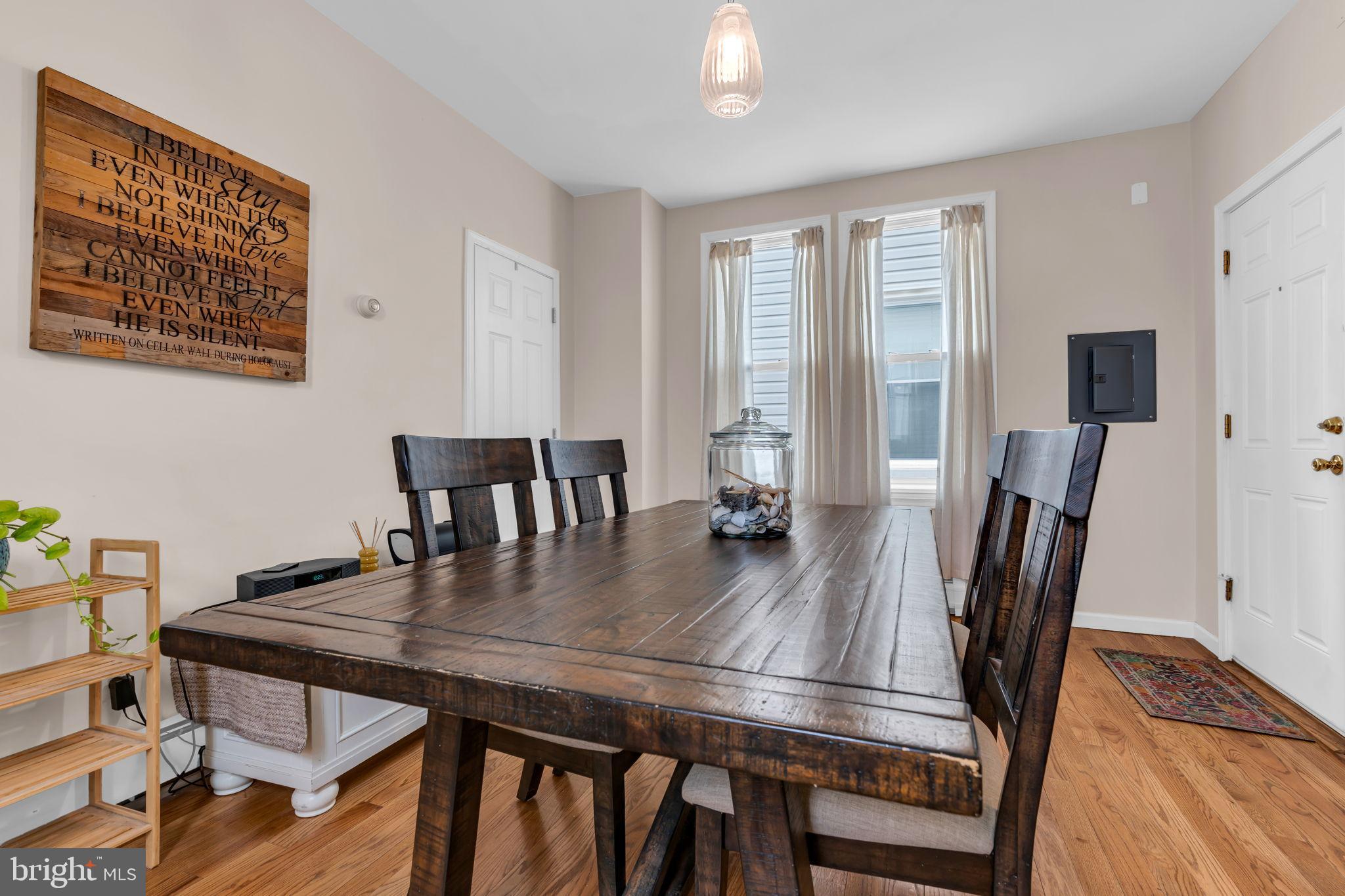 6 Beach Street Sea Bright, NJ 07760 - Photo 9 of 26 a view of a dining room with furniture window and wooden floor