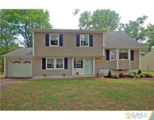 15 Hill Road Edison, NJ 08817 - Photo 1 of 13 a front view of house with yard