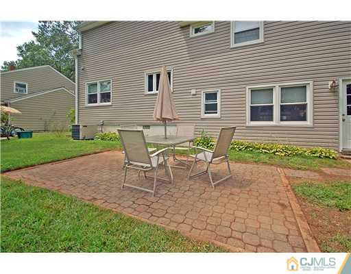 15 Hill Road Edison, NJ 08817 - Photo 13 of 13 a view of a house with backyard and sitting area