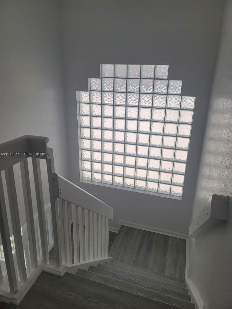 14765 Southwest 132nd Place Miami, FL 33186 - Photo 40 of 48 a view of a black and white wall