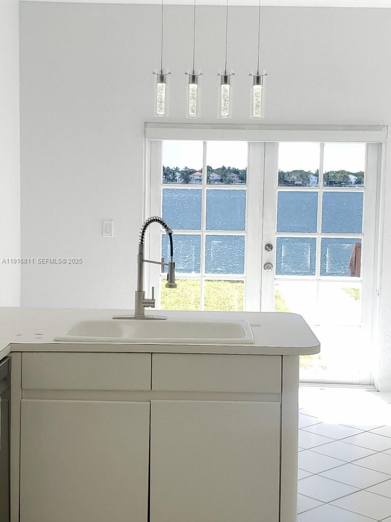 14765 Southwest 132nd Place Miami, FL 33186 - Photo 4 of 48 a close view of sink and tap