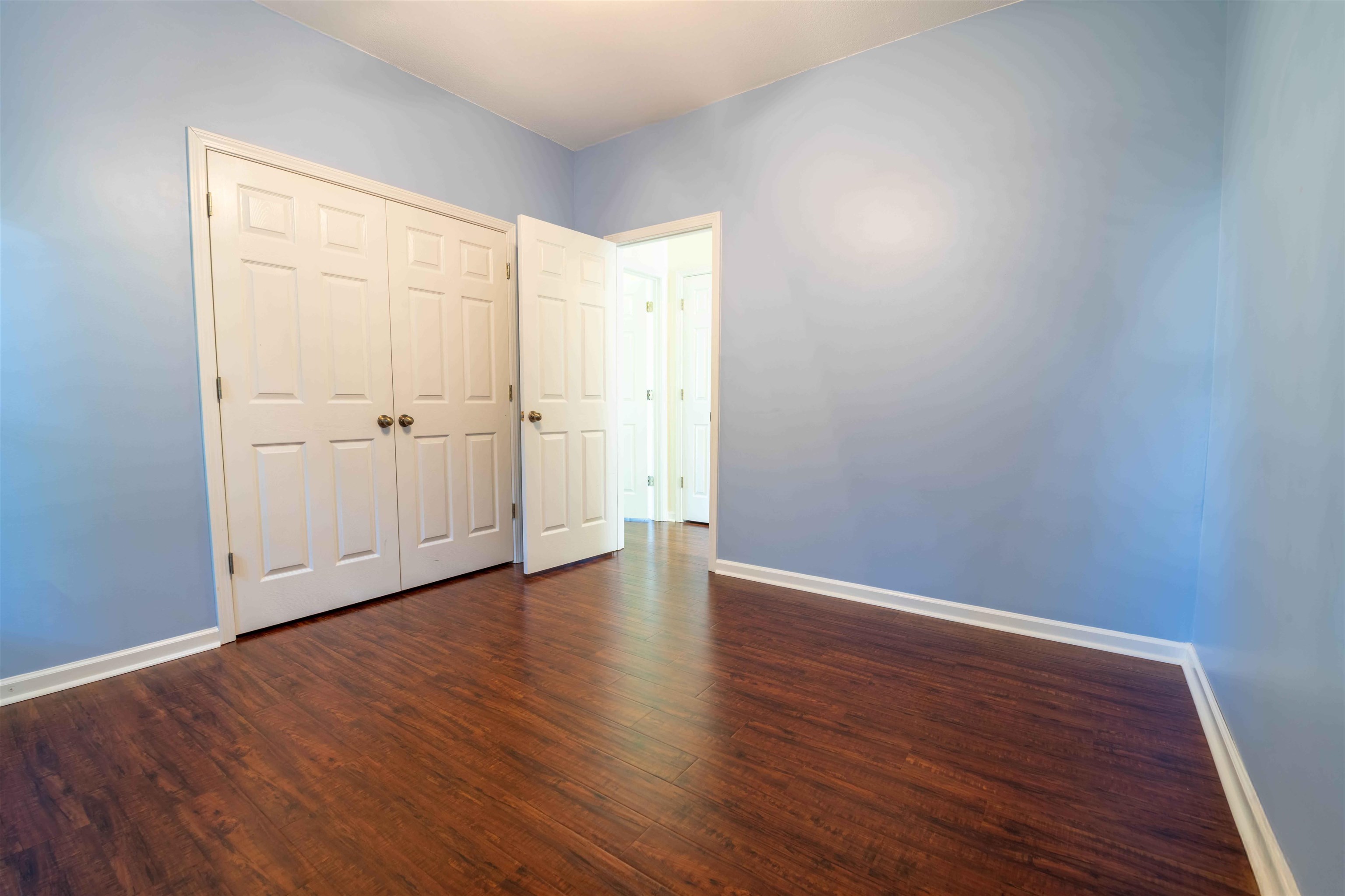 4170 Calla Drive Bartlett, TN 38135 - Photo 22 of 40 a view of an empty room with wooden floor