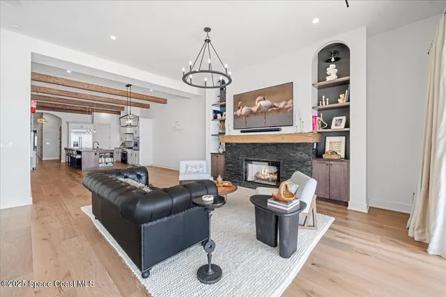 a bathroom with a granite countertop sink a mirror and shower