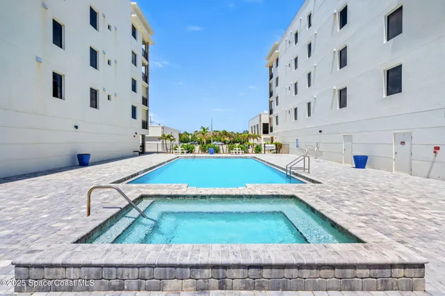 a stove top oven sitting inside of a kitchen