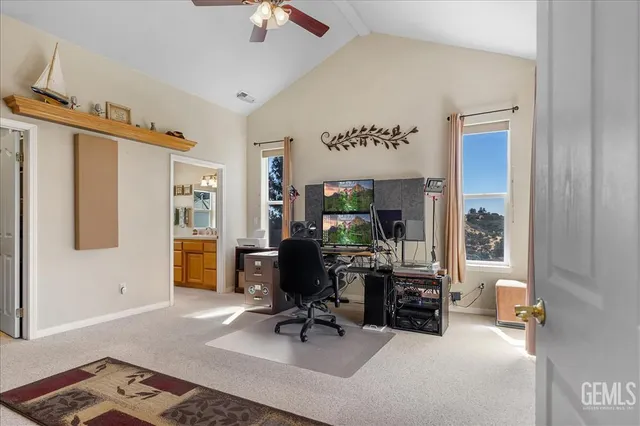 a bedroom with furniture and a window