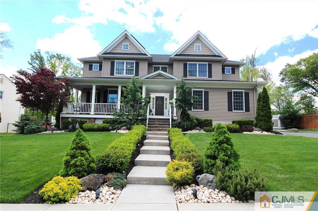 5 Timber Road Edison, NJ 08820 - Photo 1 of 24 a front view of a house with a yard