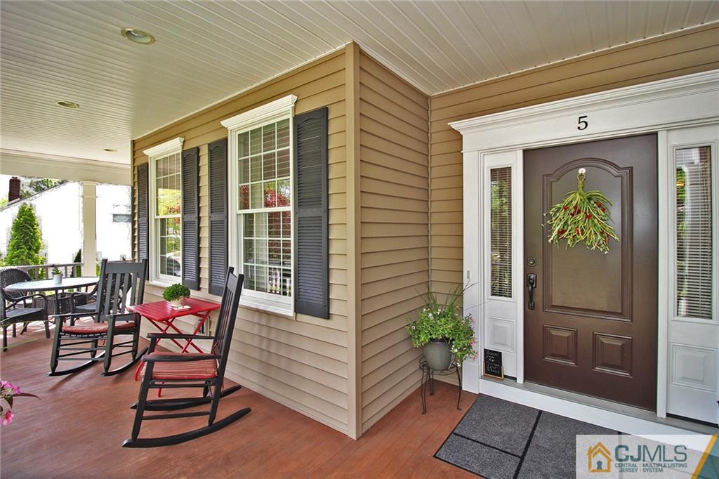 5 Timber Road Edison, NJ 08820 - Photo 2 of 24 a building outdoor space with furniture and potted plants