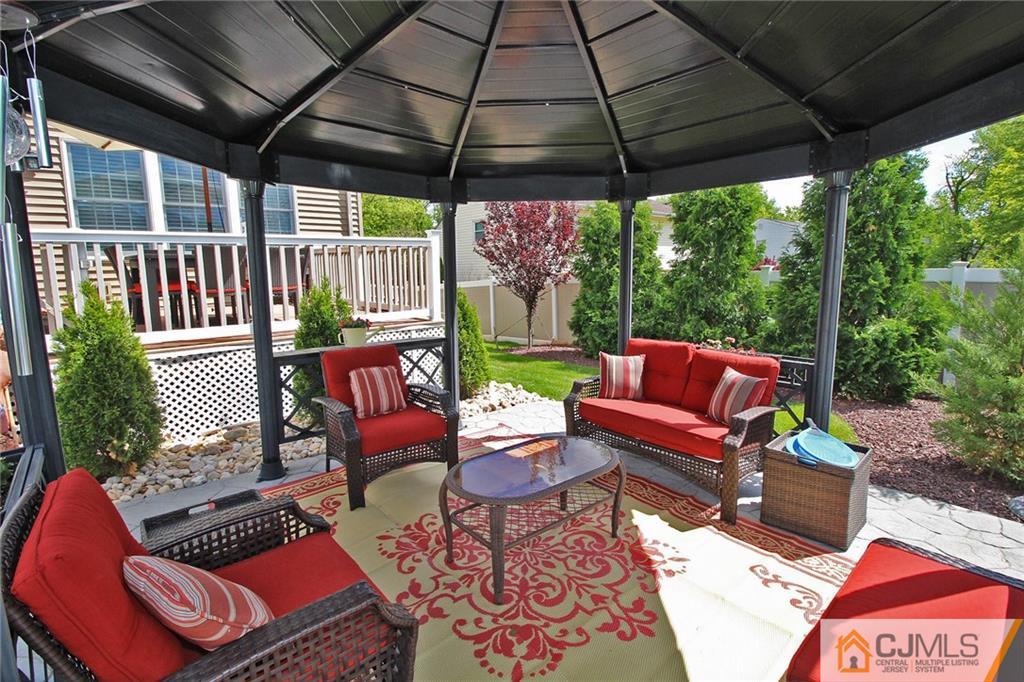 5 Timber Road Edison, NJ 08820 - Photo 22 of 24 a outdoor living space with furniture and garden view