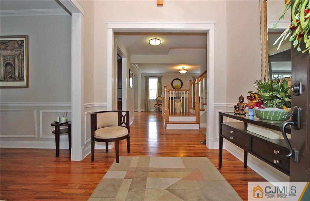 5 Timber Road Edison, NJ 08820 - Photo 4 of 24 a living room with furniture and a potted plant
