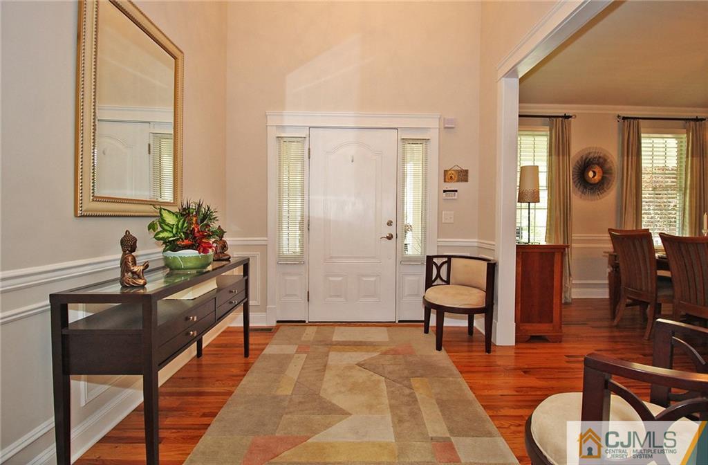 5 Timber Road Edison, NJ 08820 - Photo 5 of 24 a living room with furniture and wooden floor