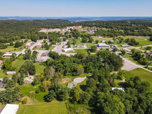 a view of balcony with furniture and wooden floor