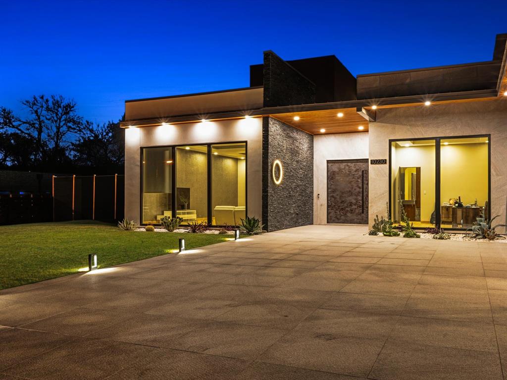 10230 Marsh Lane Dallas, TX 75229 - Photo 3 of 31 a view of a house with backyard and porch