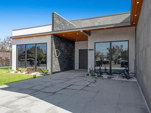 a view of swimming pool with outdoor seating
