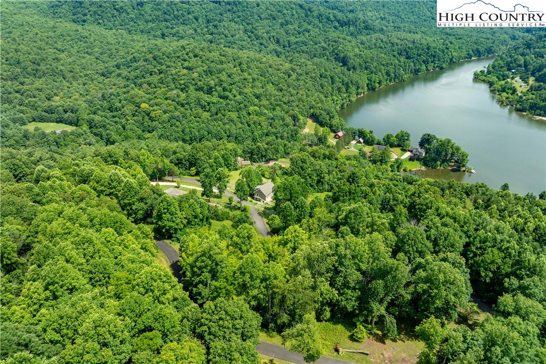 Lot 17 Lake Ridge Butler, TN 37640 - Photo 16 of 28 an aerial view of a house with a yard and lake view