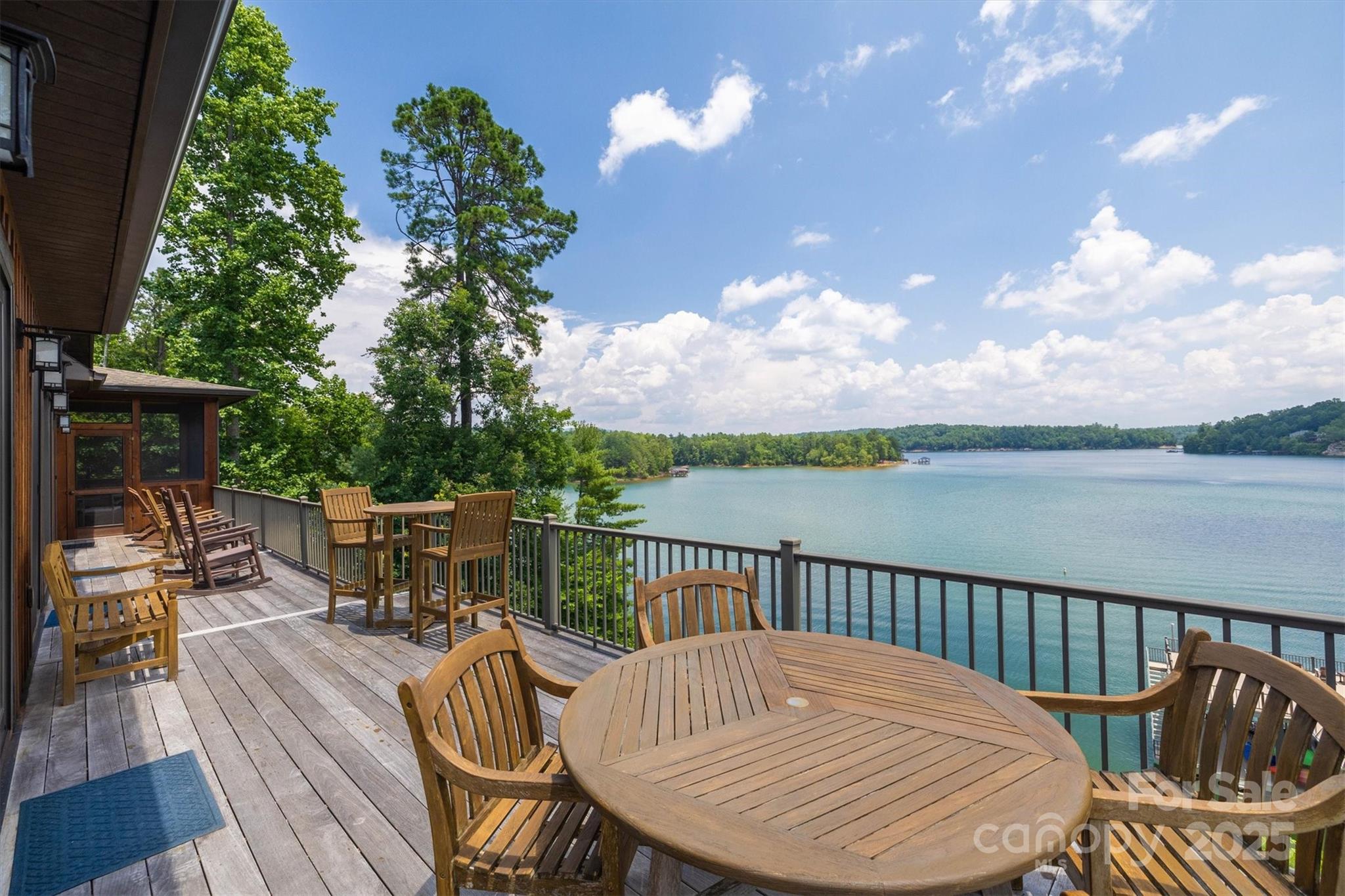 597 Waterglyn Way Nebo, NC 28761 - Photo 26 of 44 a view of a balcony dining area with furniture