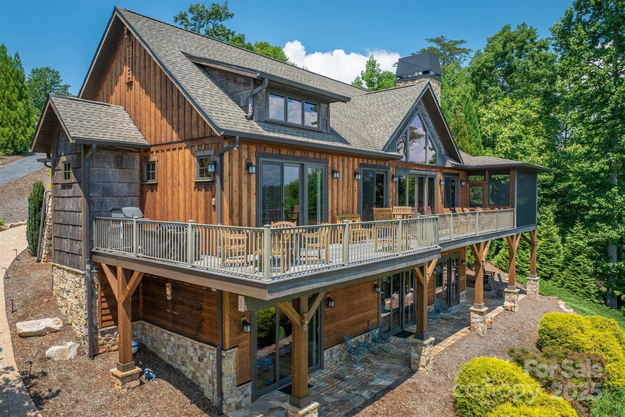 597 Waterglyn Way Nebo, NC 28761 - Photo 6 of 44 an aerial view of a house with a balcony