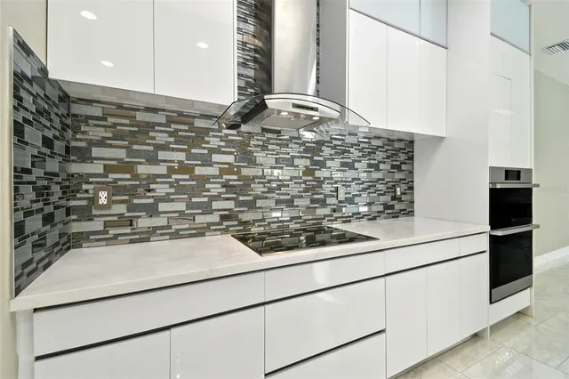 a bathroom with a shower and a sink