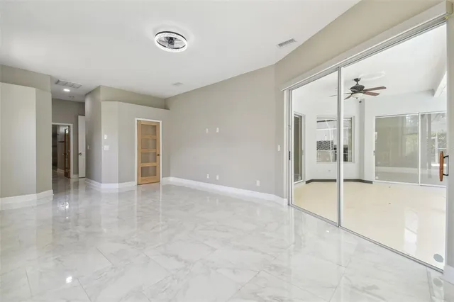 an empty room with windows