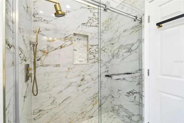 an aerial view of a house with pool